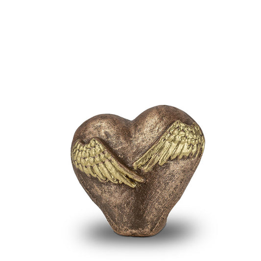Keramische troost urn met vleugels