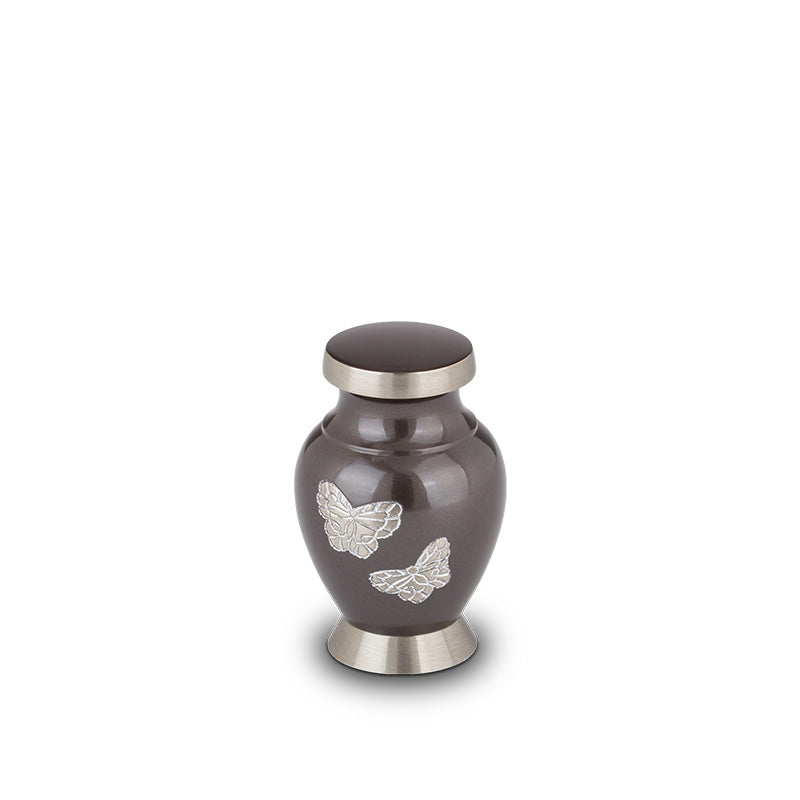 Moderne urn met vlinder grijs zilver