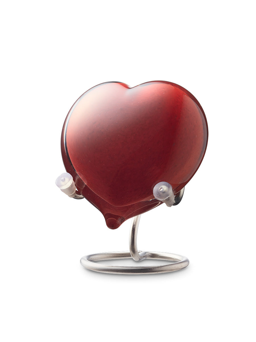 Urn in de vorm van een hart in de kleur rood