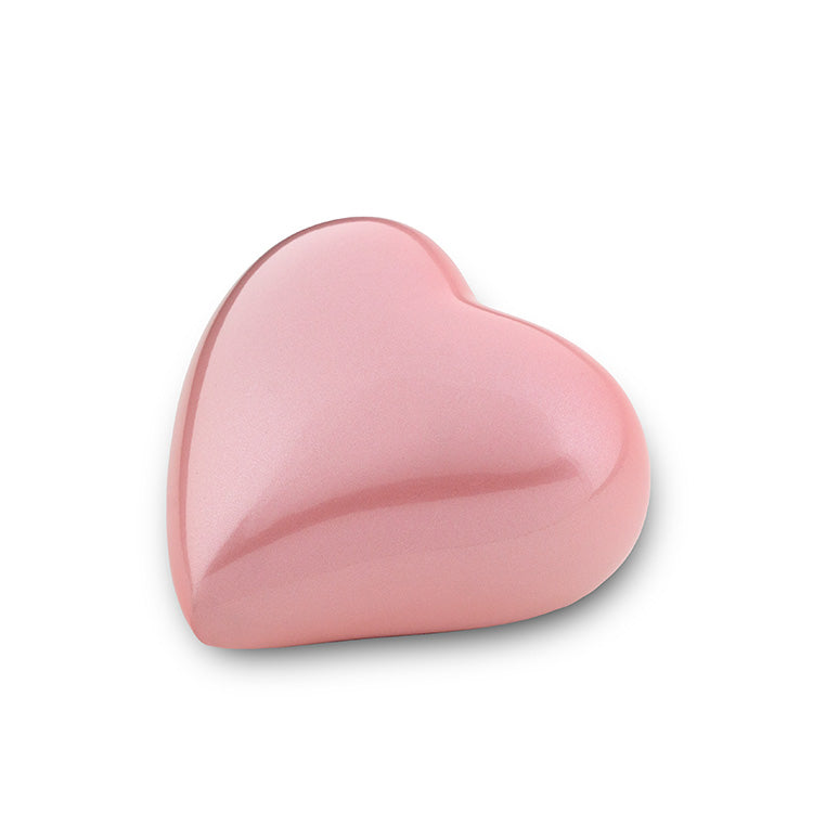 Urn in de vorm van een hartje roze