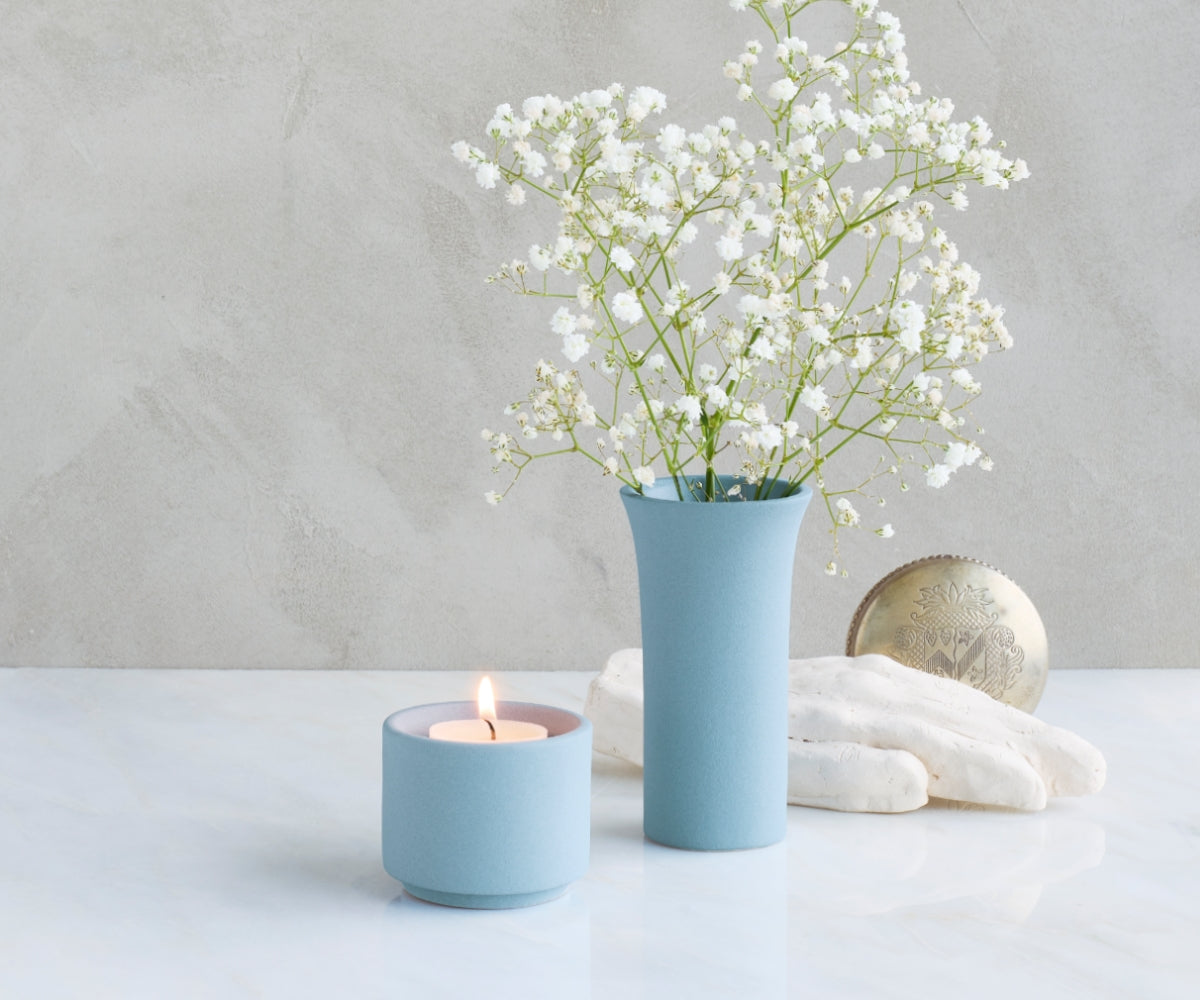 Urn theelicht van keramiek in de kleur blauw grijs