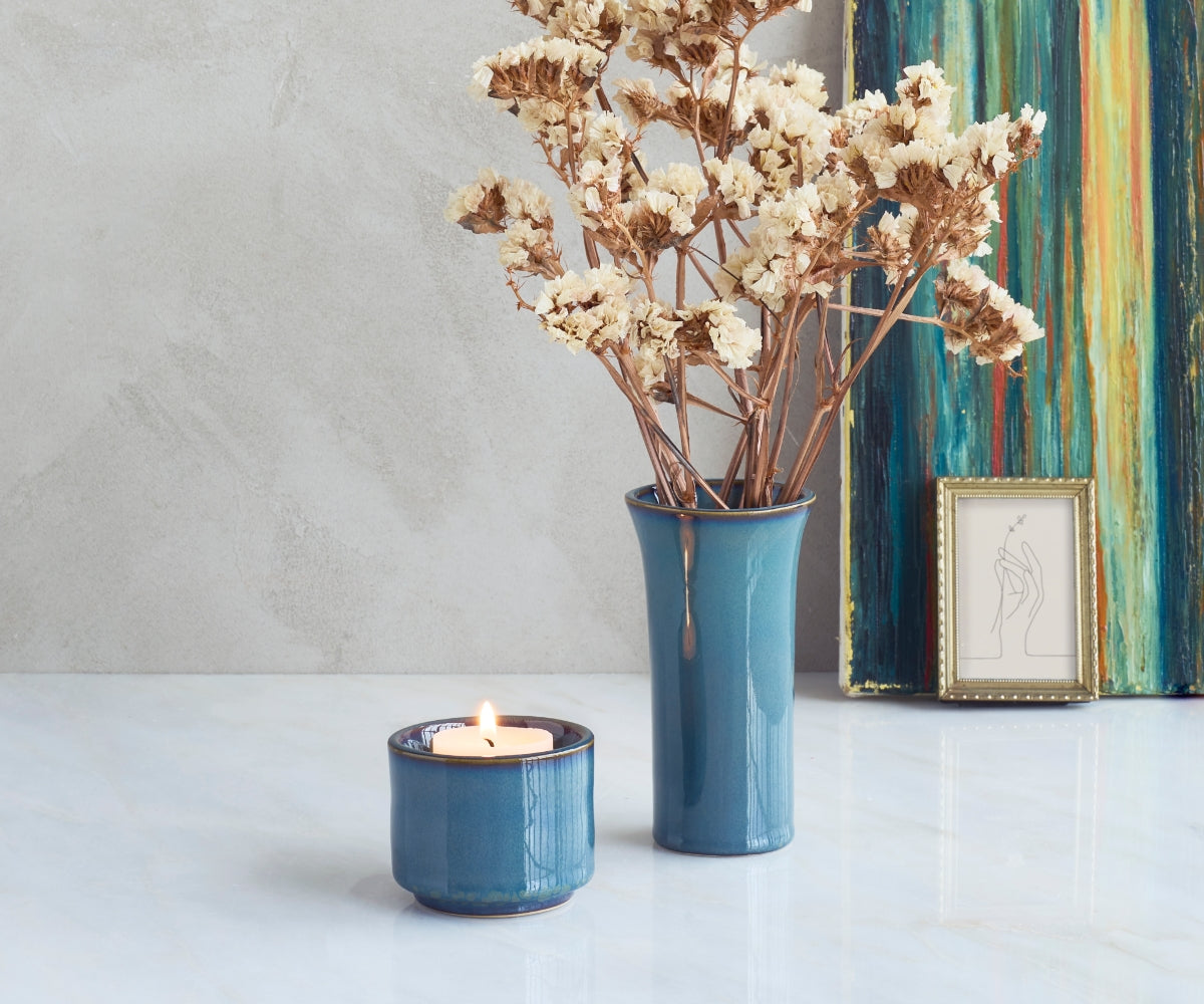 Urn theelicht van keramiek in de kleur groen blauw